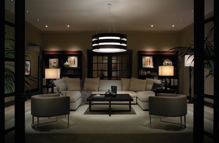 A living room with customized lighting design and dimmable lighting.