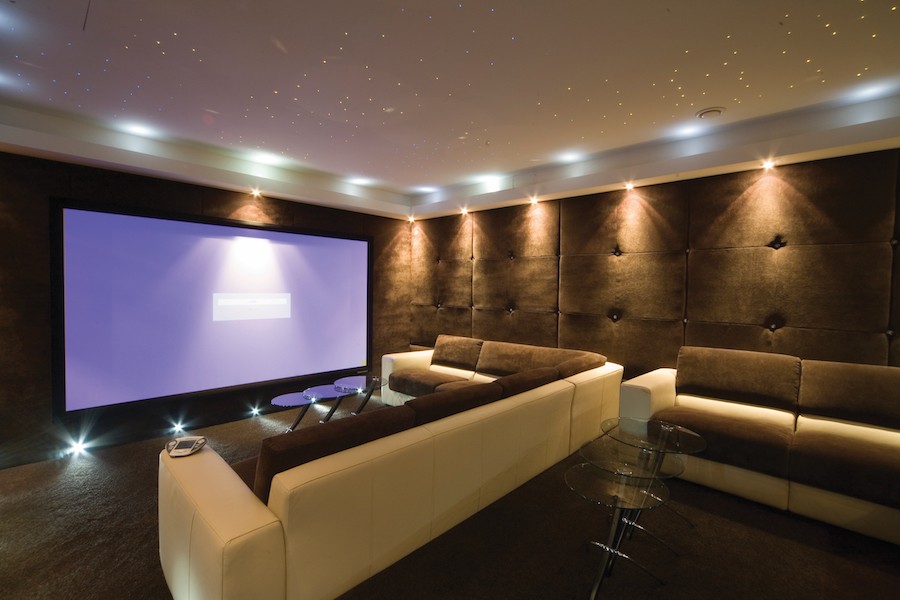 Elevate your home theater with a Crestron smart home control.